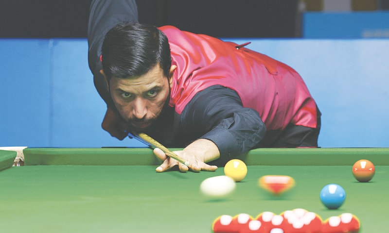 CHENGDU: Pakistan&rsquo;s Mohammad Asif in action during the World Games snooker bronze medal match against Germany&rsquo;s Alexander Widau at the China Tianfu Campus Gymnasium on Wednesday.&mdash;Reuters