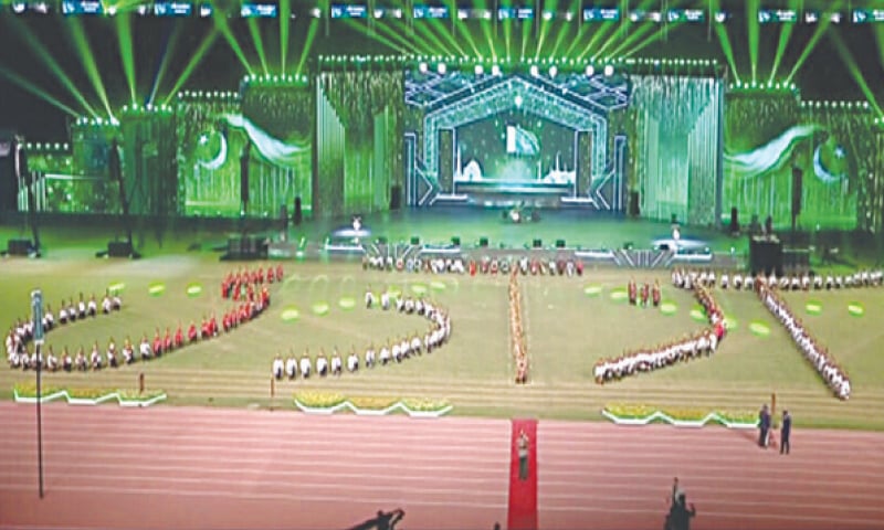 Participants line up in a formation depicting the word &lsquo;Azaadi&rsquo; (freedom) during a grand ceremony to mark Marka-i-Haq and Independence Day, held at Islamabad&rsquo;s sports complex.&mdash;DawnNewsTV screengrab