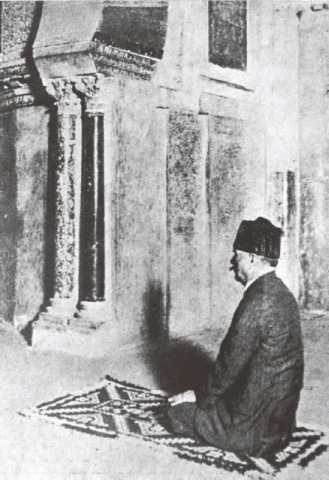 Allama Iqbal offers prayers in the mosque of Cordoba, Spain, in 1933.
