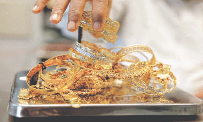 Gold prices fell on Thursday as hotter-than-expected US inflation data and a drop in jobless claims lifted the dollar and Treasury yields, trimming the odds of a supersized September rate cut. Spot gold fell 0.5pc to $3,337.21. US gold futures for December delivery settled 0.7pc lower at $3,383.2 an ounce.—Reuters Gold prices fell on Thursday as hotter-than-expected US inflation data and a drop in jobless claims lifted the dollar and Treasury yields, trimming the odds of a supersized September rate cut. Spot gold fell 0.5pc to $3,337.21. US gold futures for December delivery settled 0.7pc lower at $3,383.2 an ounce.—Reuters