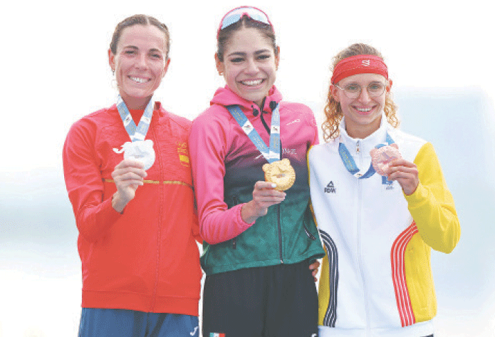  GOLD medallist Mexico&rsquo;s Anahi Alvarez (C) celebrates on the podium alongside silver winner Maria Varo Zubiri of Spain (L) and bronze medallist Belgium&rsquo;s Jeanne DuPont after the World Games women&rsquo;s individual duathlon event at the Xinglong Lake Hubin Arena on Friday.&mdash;Reuters 