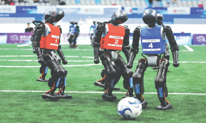 Robots take part in a soccer match at the inaugural World Humanoid Robot Games in Beijing.—Reuters Robots take part in a soccer match at the inaugural World Humanoid Robot Games in Beijing.—Reuters