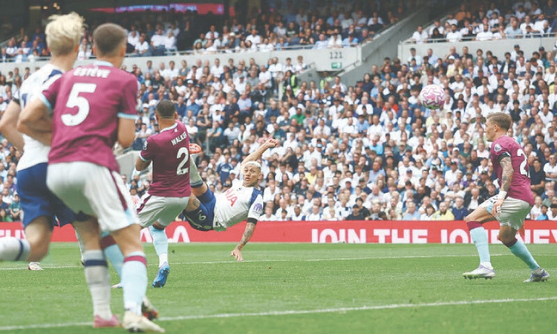LONDON: Tottenham Hotspur’s Richarlison (second R) scores with an acrobatic kick during the Premier League match against Burnley at the Tottenham Hotspur Stadium on Saturday.—Reuters LONDON: Tottenham Hotspur’s Richarlison (second R) scores with an acrobatic kick during the Premier League match against Burnley at the Tottenham Hotspur Stadium on Saturday.—Reuters