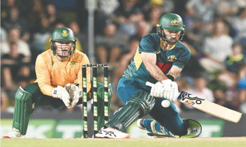 CAIRNS: Australian batter Glenn Maxwell plays a reverse sweep for six during the third Twenty20 International against South Africa on Saturday.&mdash;AFP