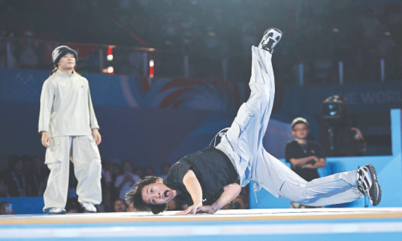 CHINA&rsquo;S Liu Qingyi competes against compatriot Guo Pu in the women&rsquo;s breaking b-girls gold medal final of the World Games at the Chengbei Gymnasium on Sunday.&mdash;AFP