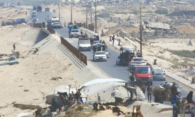 Palestinian families, fleeing their homes in Gaza City, arrive at the Nuseirat refugee camp amid fears of an imminent Israeli attack.&mdash;AFP