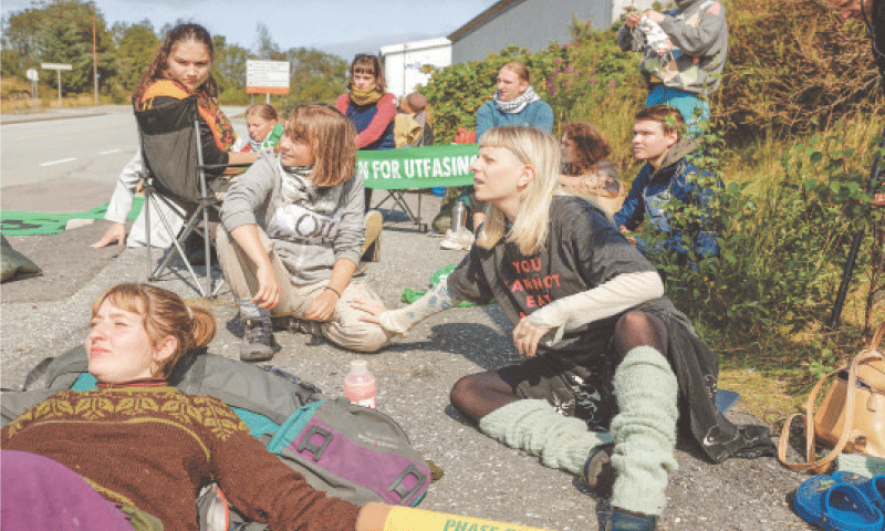 CLIMATE activist Greta Thunberg and artist Aurora Aksnes join a protest by Extinction Rebellion at an oil refinery in Mongstad, Norway.&mdash;Reuters