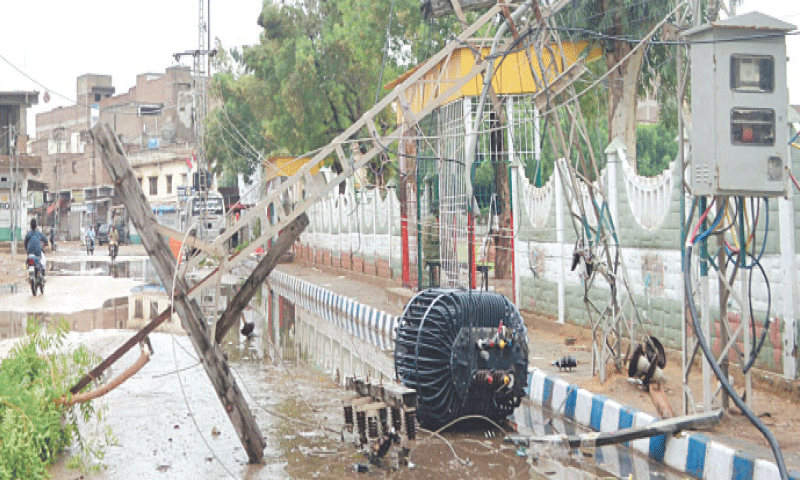 ONE of the several poles brought down by strong winds in Latifabad area of Hyderabad district.&mdash;Umair Ali