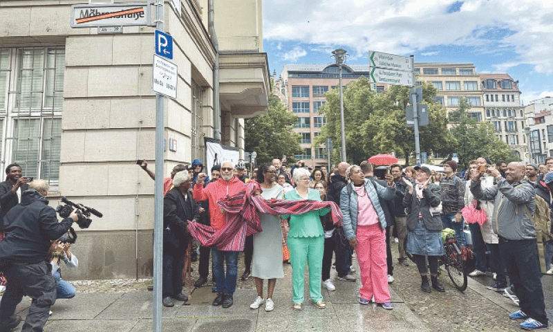 Guests attend the unveiling ceremony for the renaming of Moors Street to Anton Wilhelm Amo Street after the first known philosopher of African origin in Germany.&mdash;AFP