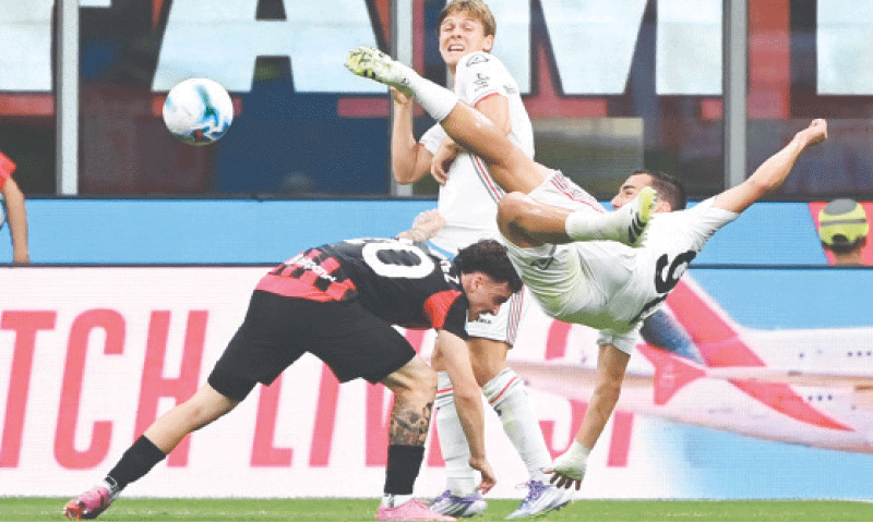 MILAN: Cremonese&rsquo;s Federico Bonazzoli (R) scores during the Serie A match against AC Milan at San Siro.&mdash;AFP