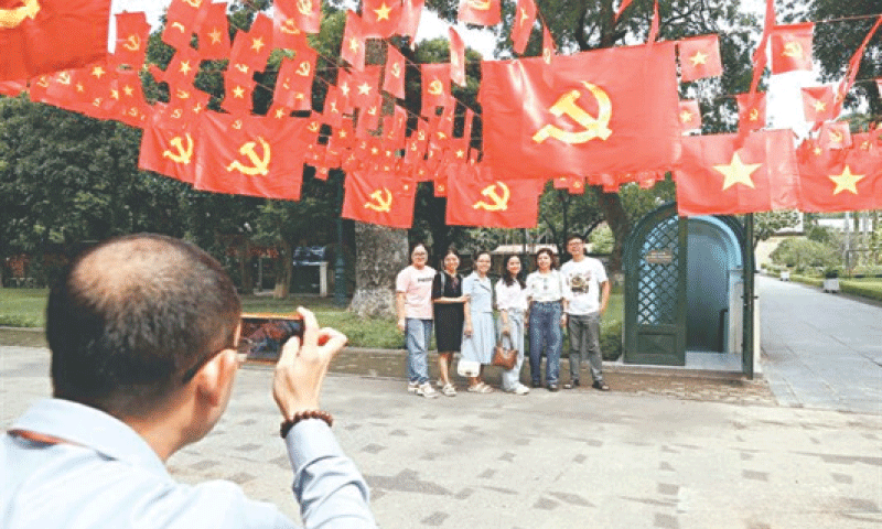 Visitors take photos during their tour to historic bunkers that open to public for the first time.&mdash;Courtesy Vietnam News