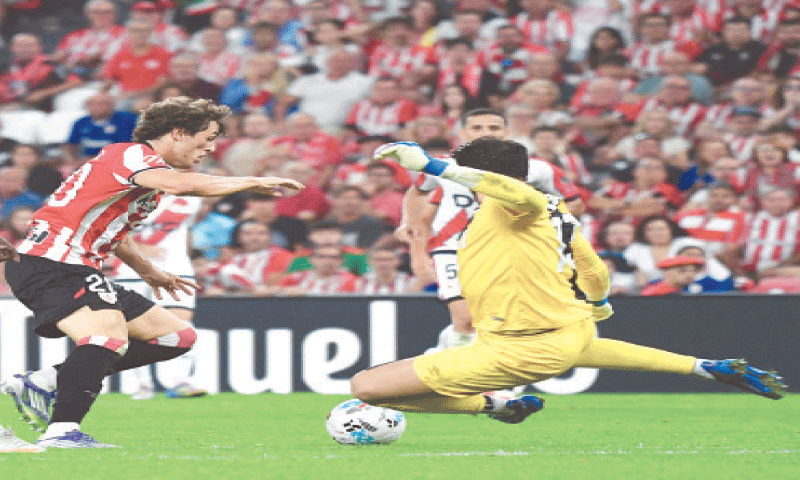 BILBAO: Rayo Vallecano&rsquo;s goalkeeper Augusto Batalla blocks a shot by Unai Gomez of Athletic Bilbao during their La Liga match at the San Mames Stadium.&mdash;AFP