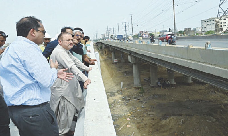Sindh Senior Minister Sharjeel Memon inspects the Jam Sadiq Bridge that connects Korangi with the city.&mdash;PPI
