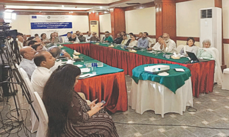 Meeting participants take part in a discussion during the session.&mdash;Dawn