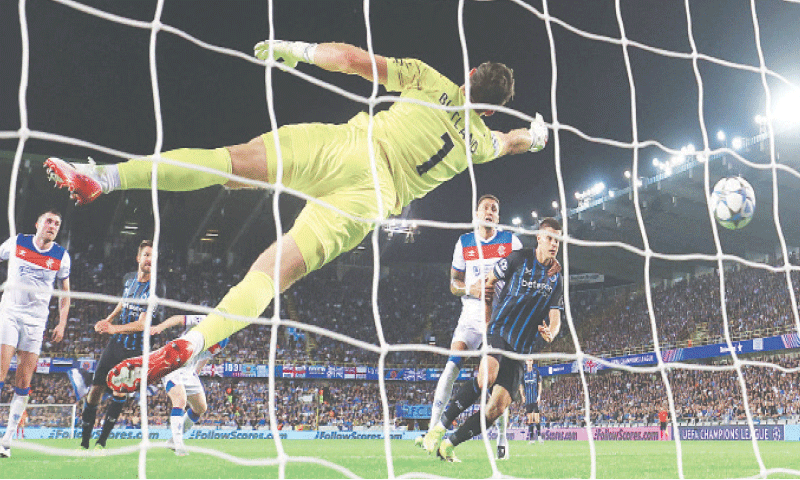 BRUGGE: Club Brugge&rsquo;s Hans Vanaken (not pictured) scores past Rangers goalkeeper Jack Butland during their Champions League playoff second leg at Jan Breydelstadion.&mdash;Reuters
