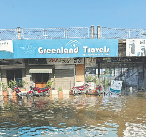 GUJRAT: Water accumulation in the market of Zahoor Elahi cricket stadium. &mdash;Dawn