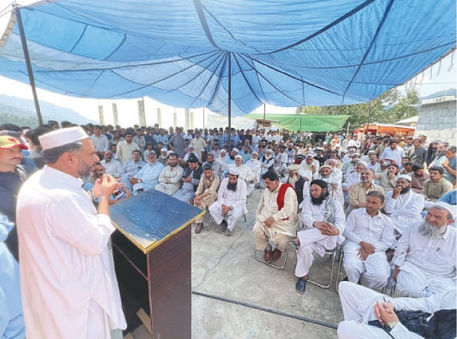 A speaker addresses the jirga in Lajbok, Lower Dir, on Thursday. — Dawn A speaker addresses the jirga in Lajbok, Lower Dir, on Thursday. — Dawn