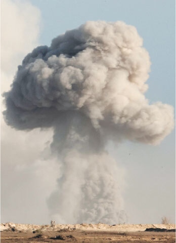  A massive cloud of smoke rises after Israeli bombardment of Gaza City.&mdash;AFP 
