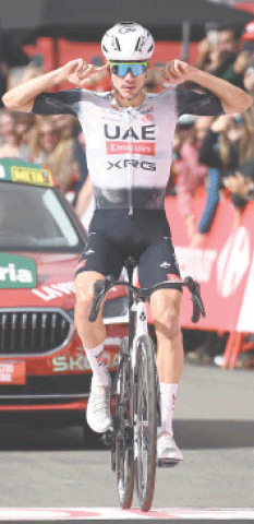 TEAM UAE&rsquo;s Spanish rider Juan Ayuso gestures as he celebrates after crossing the finish line to win the seventh stage of the Vuelta a Espana, a 187km distance from Andorra la Vella to Cerler, on Friday.&mdash;AFP
