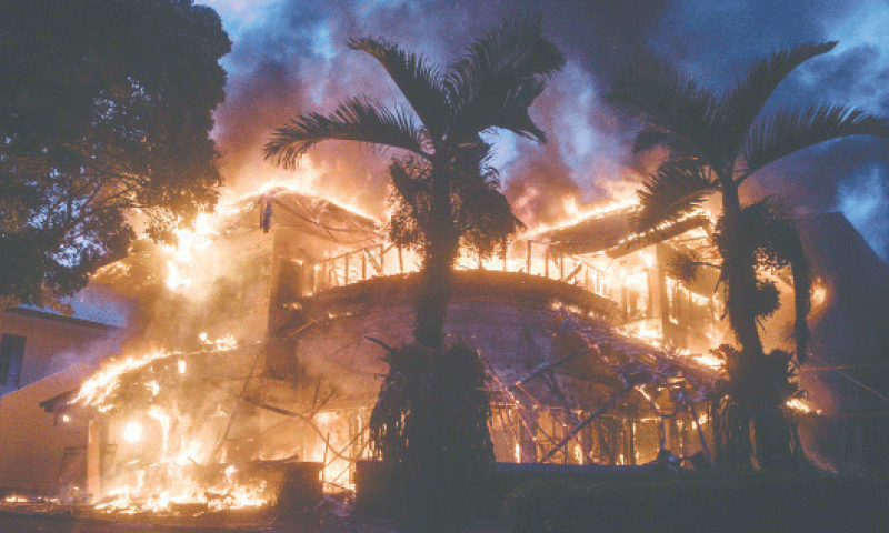 A GUESTHOUSE of Indonesia&rsquo;s Consultative Assembly burns after it was set on fire during a protest
in Bandung.&mdash;AFP
