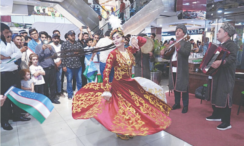 An Uzbek dancer performs along with a team of musicians to celebrate their country’s national day in Islamabad on Sunday. — Photo by Mohammad Asim. An Uzbek dancer performs along with a team of musicians to celebrate their country’s national day in Islamabad on Sunday. — Photo by Mohammad Asim.