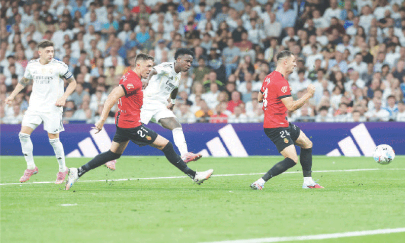 MADRID: Real Madrid&rsquo;s Vinicius Junior (second R) scores during the La Liga match against Mallorca at Santiago Bernabeu.&mdash;AFP