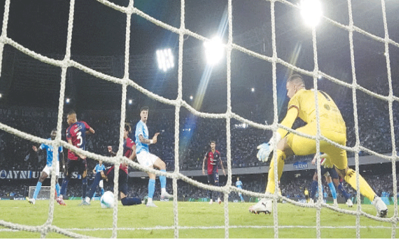 NAPLES: Napoli&rsquo;s Frank Anguissa (L) scores during the Serie A match against Cagliari at Stadio Diego Armando Maradona.&mdash;Reuters