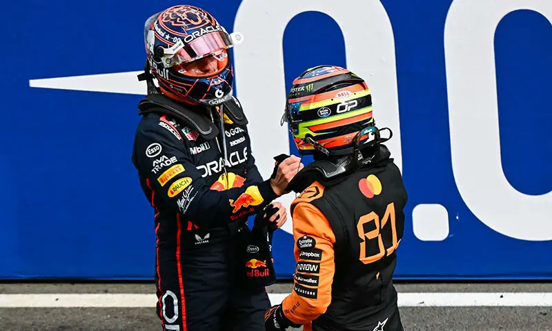 McLaren&rsquo;s Australian driver Oscar Piastri (R) is congratulated by second-placed Red Bull Racing&rsquo;s Dutch driver Max Verstappen after winning the Formula One Dutch Grand Prix at The Circuit Zandvoort, western Netherlands, on August 31, 2025. &mdash; AFP