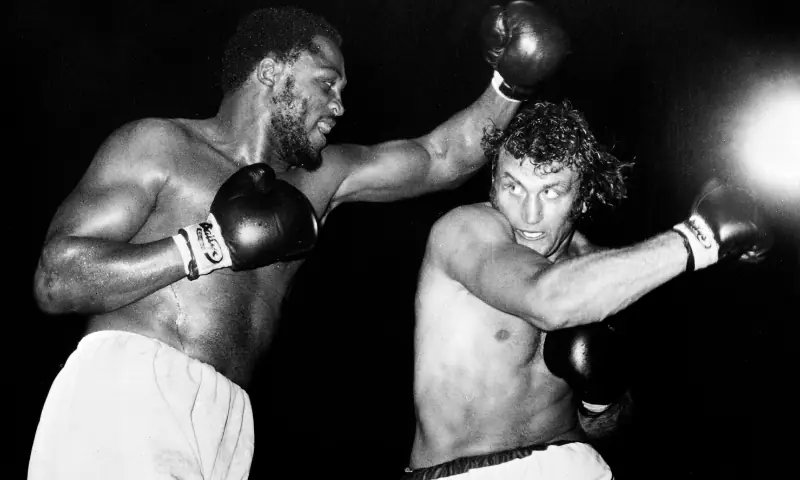 US Heavyweight boxer Joe Frazier (L) and British Heavyweight boxer Joe Bugner (R) fight at Earls Court Arena in London on July 2, 1973. Former European champion, British heavyweight boxer Joe Bugner has died at the age of 75, it has been reported, September 1. &mdash; AFP/File