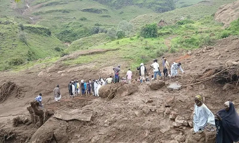 People inspecting the debris after a landslide devastated the village of Tarasin in Sudan&rsquo;s Jebel Marra area, Sept 2. &mdash; AFP