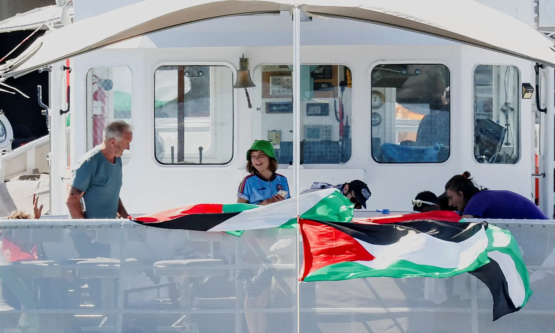  Swedish activist Greta Thunberg and other Global Sumud Flotilla members wait on their boat to depart to Gaza from Barcelona, Spain on September 1, 2025, after stormy weather forced the flotilla to return to port earlier. &mdash; Reuters/Bruna Casas 