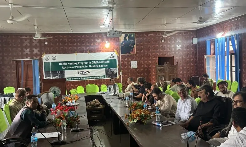 An auction being held for animal hunting permits at the Gilgit-Baltistan Wildlife and Parks Department on Wednesday. &mdash; Photo by author