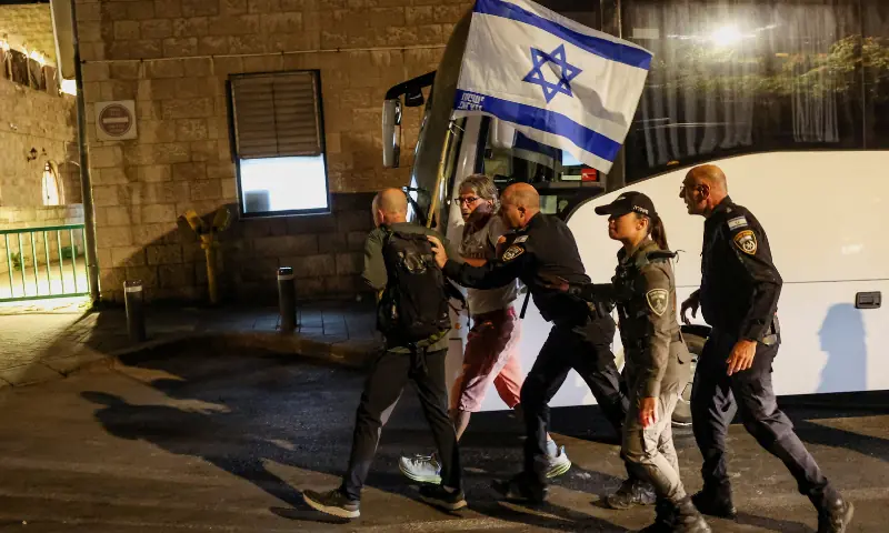 Police officers detain demonstrators, one of them holding an Israeli flag, during a protest demanding the immediate release of the hostages kidnapped during the deadly October 7, 2023 attack on Israel by Hamas, in Jerusalem, on September 3, 2025. — Reuters