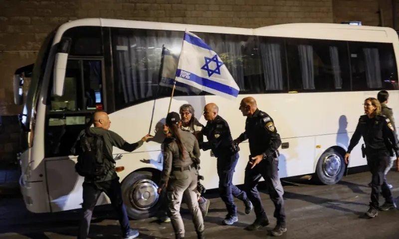 Police officers detain a demonstrator holding an Israeli flag during a protest demanding the immediate release of the hostages kidnapped during the October 7, 2023, attack on Israel by Hamas, in Jerusalem, on September 3, 2025. &mdash; Reuters