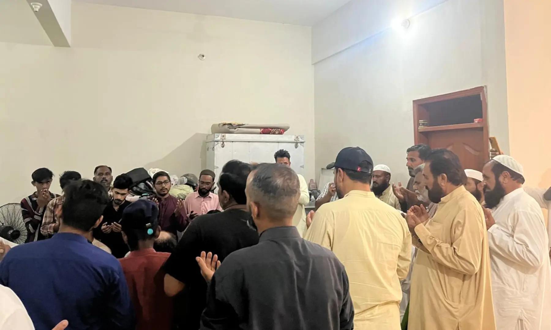 Members of the dumper truck association visit Shakir’s house.