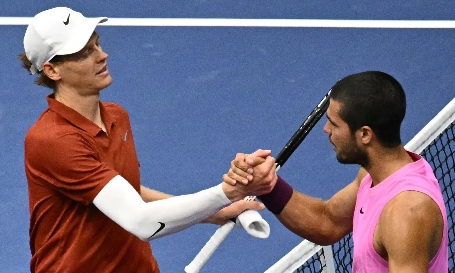 Italy’s Jannik Sinner (L) and Spain’s Carlos Alcaraz shake hands at the net after alcaraz won the men’s singles final tennis match on day fifteen of the US Open tennis tournament at the USTA Billie Jean King National Tennis Centre on Sept 7, 2025 in New York City. — AFP Italy’s Jannik Sinner (L) and Spain’s Carlos Alcaraz shake hands at the net after alcaraz won the men’s singles final tennis match on day fifteen of the US Open tennis tournament at the USTA Billie Jean King National Tennis Centre on Sept 7, 2025 in New York City. — AFP