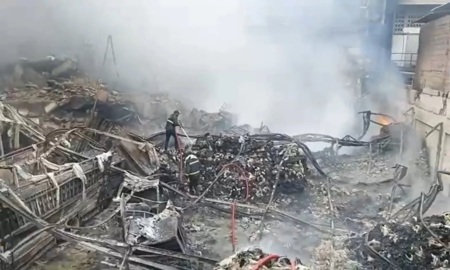 Rescue personnel are on the site of a fire at a garment factory in New Karachi Industrial Area on Sept 9, 2025. — via author Rescue personnel are on the site of a fire at a garment factory in New Karachi Industrial Area on Sept 9, 2025. — via author