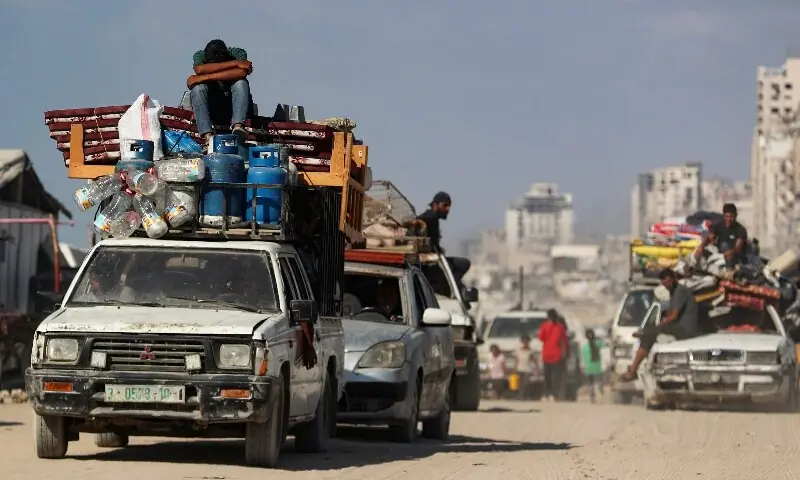 Displaced Palestinians transport their belongings in a vehicle as they flee amid an Israeli military operation, following an Israeli evacuation order, in Gaza City, September 9. &mdash; Reuters