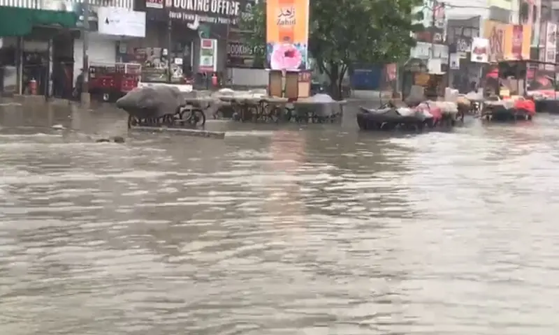 The image shows a flooded street in North Karachi on Sept 10, 2025. — DawnNewsTV