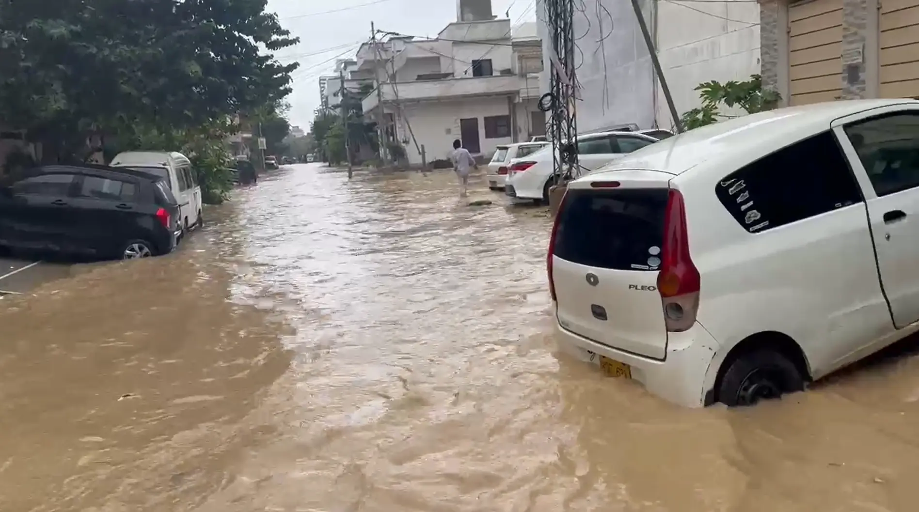 The image shows a flooded street in Saadi Town, Karachi on Sept 10, 2025. &mdash; DawnNewsTV