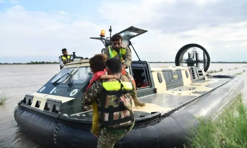 Pakistan Navy’s emergency response team employs a hovercraft to rescue flood-affected locals in rural Sindh. — Pakistan Navy