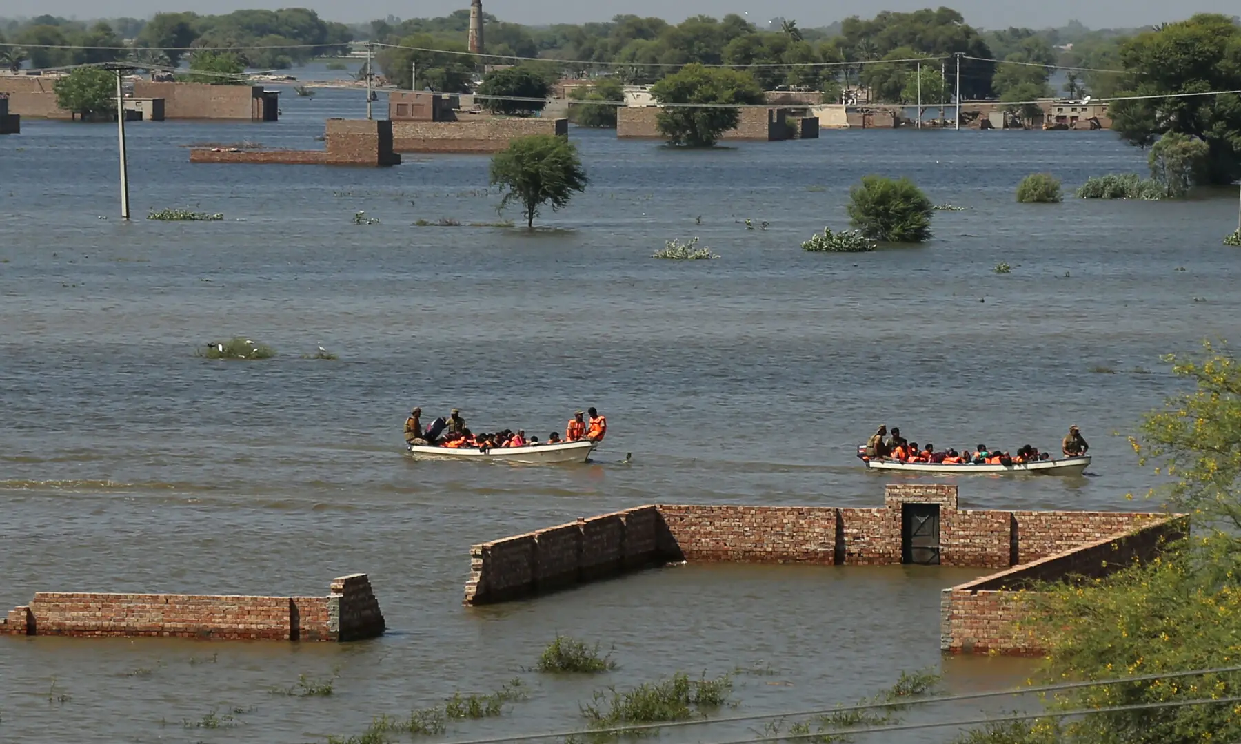  Army troops rescue flood-affected villagers by boats in Jalalpur Pirwala of Multan district in Punjab on Sept 10, 2025. &mdash; AFP 