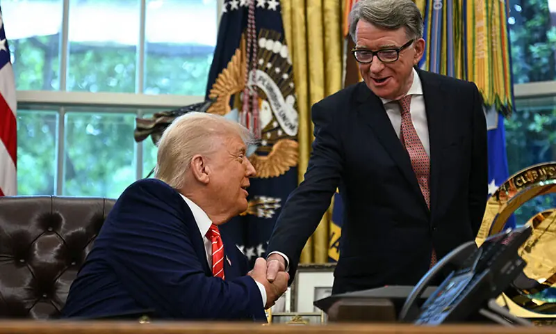  US President Donald Trump shakes hands with British ambassador to the United States Peter Mandelson after making a trade announcement in the Oval Office of the White House in Washington, DC, US, May 8. — AFP 