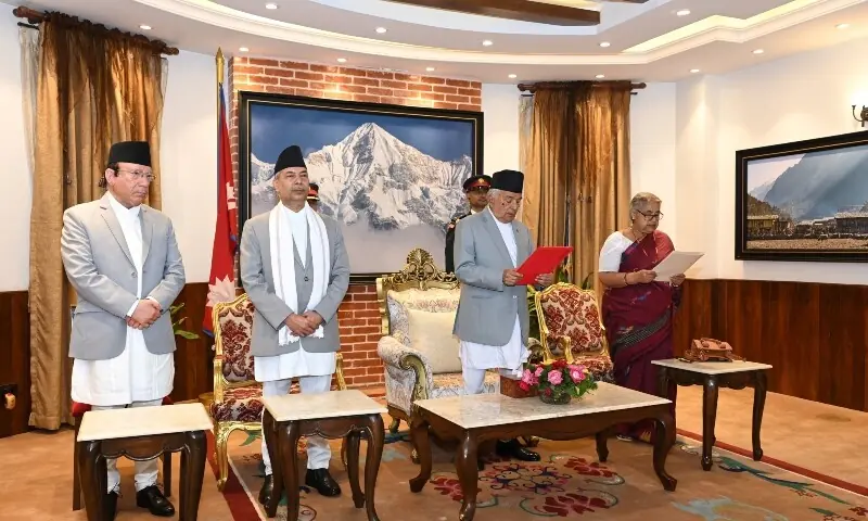 Nepal&rsquo;s President Ramchandra Paudel administers the oath of office to Sushila Karki, a former chief justice, as Nepal&rsquo;s interim prime minister during a swearing-in ceremony, following violent anti-graft protests, at the president&rsquo;s office in Kathmandu, Nepal, Sept 12. &mdash; Reuters