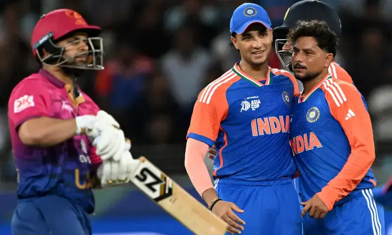 India’s Kuldeep Yadav (R) celebrates with teammates after taking the wicket of UAE’s Harshit Kaushik during the Asia Cup 2025 Twenty20 international cricket match between United Arab Emirates and India at the Dubai International Stadium in Dubai on September 10. — AFP