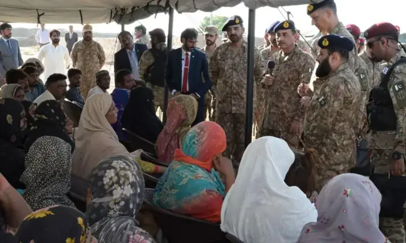 COAS Field Marshal Asim Munir interacts with flood-affected people in Punjab in a picture released on Sept 13, 2025. &mdash; ISPR