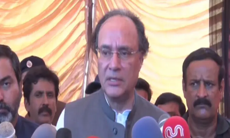 Finance Minister Muhammad Aurangzeb speaks to the media during a visit to Kamalia on Sept 14. &mdash; DawnNewsTV