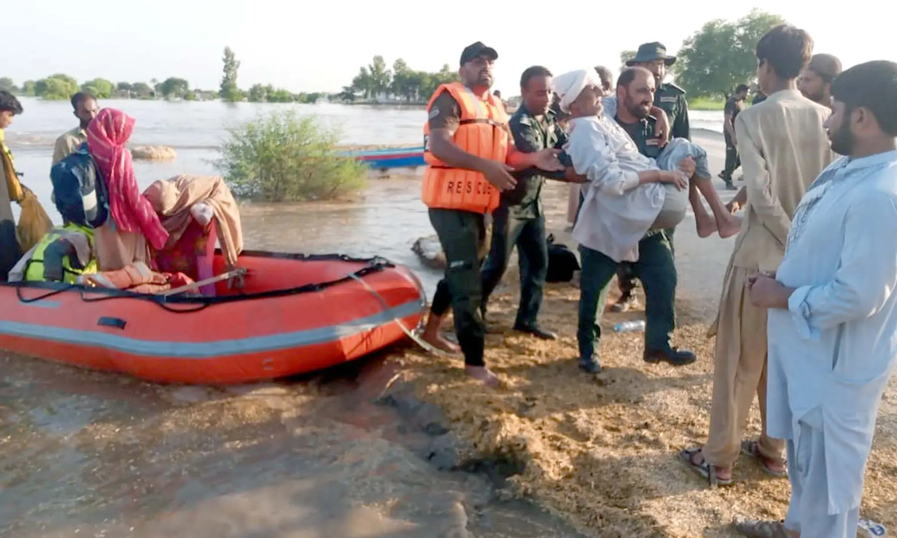  Rescue officials rescue flood-affected people in Muzaffargarh on Sept 13, 2025. &mdash; PPI Images 
