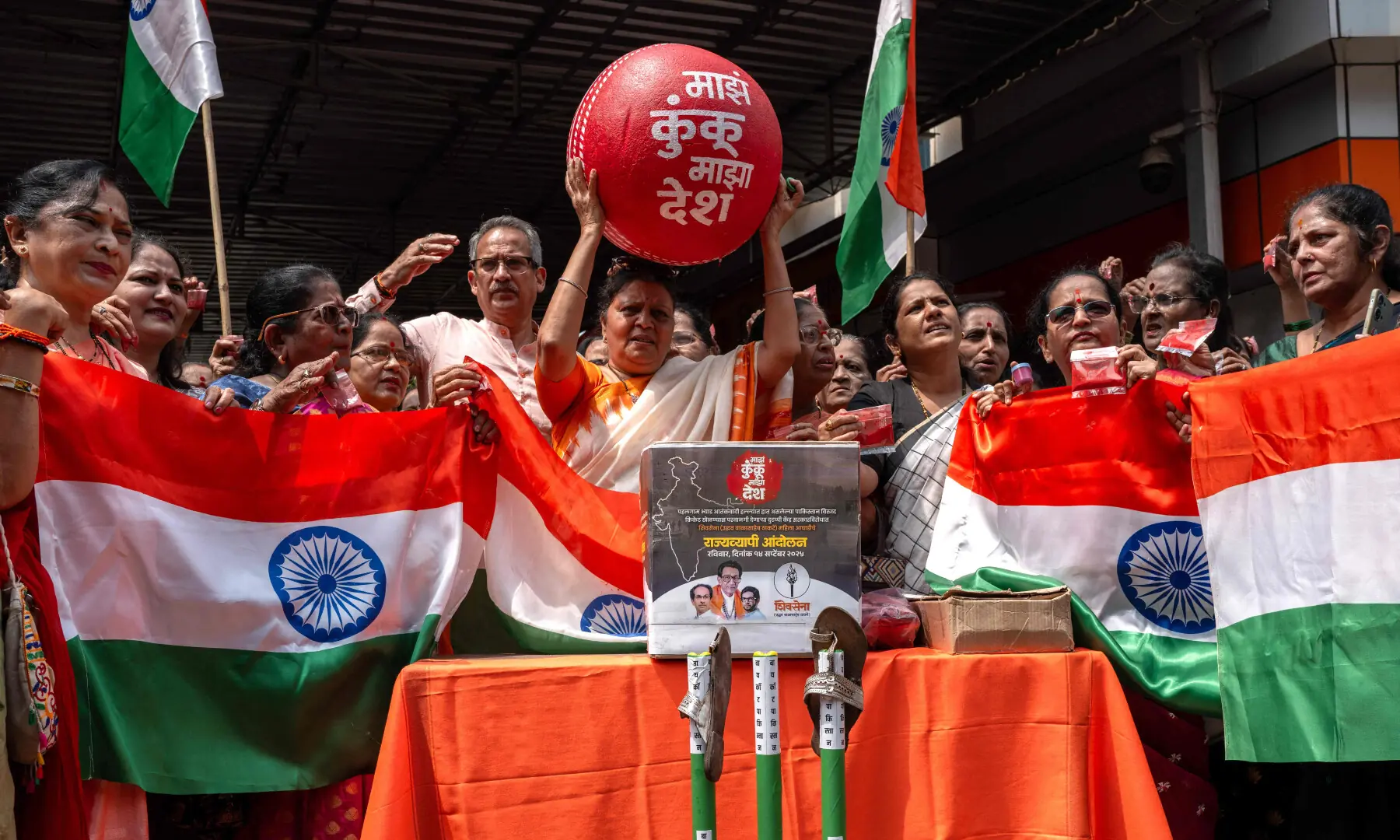 Women activists of the Hindu right-wing political party Shiv Sena-UBT hold national flags as they take part in a protest in Mumbai on Sept 14, 2025 against the cricket match between India and Pakistan in the ongoing Asia Cup tournament in Dubai. — AFP