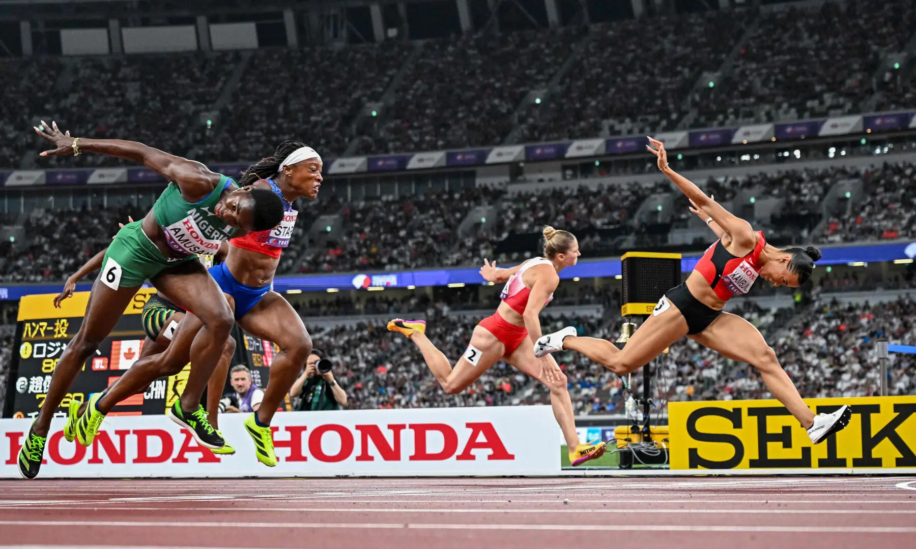  (L-R) Nigeria&rsquo;s athlete Tobi Amusan, US&rsquo; athlete Grace Stark, Poland&rsquo;s athlete Pia Skrzyszowska and Switzerland&rsquo;s athlete Ditaji Kambundji cross the finish line as they compete in the women&rsquo;s 100m hurdles final during the World Athletics Championships in Tokyo on September 15, 2025. &mdash; AFP 